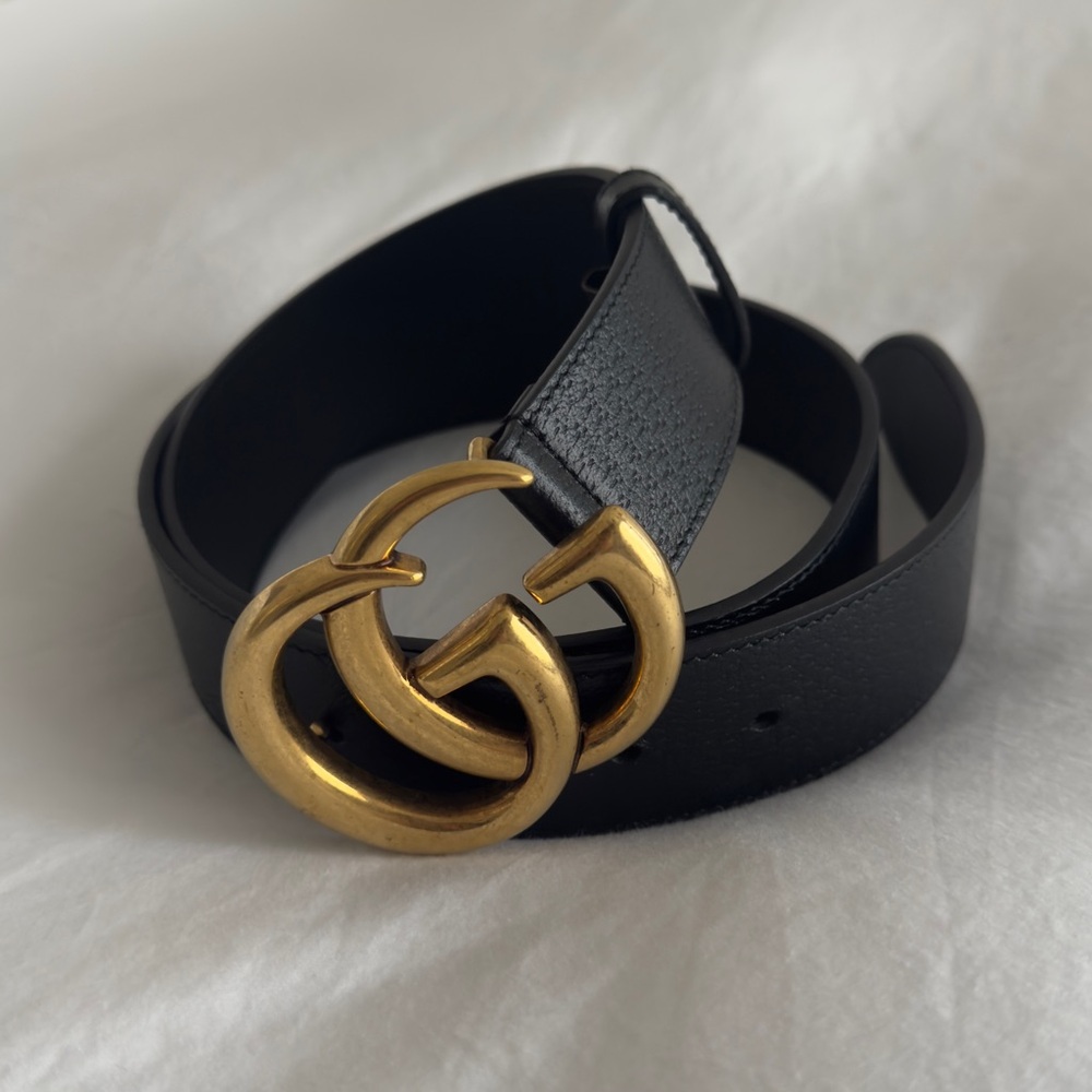 Gucci Black and Gold Belt with Iconic GG Buckle